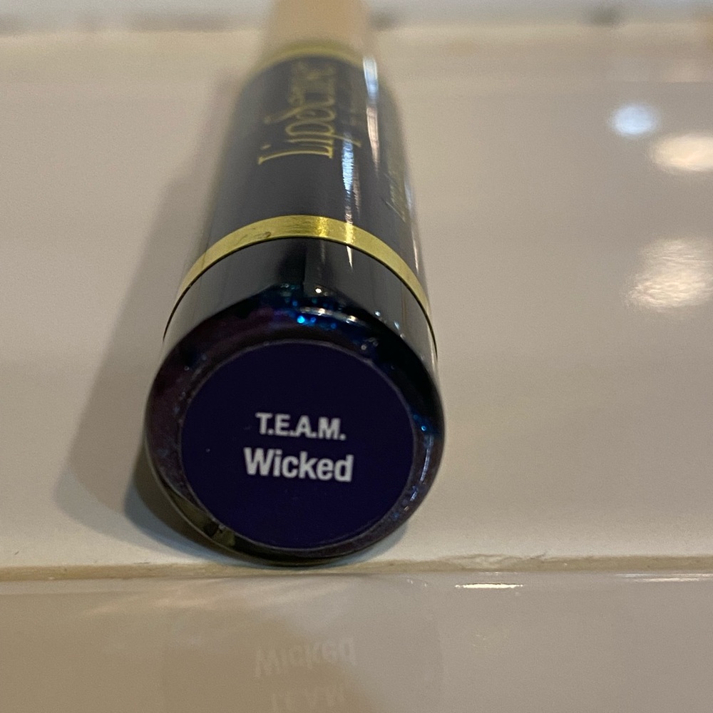 LipSense T.E.A.M. Wicked, sealed tube.